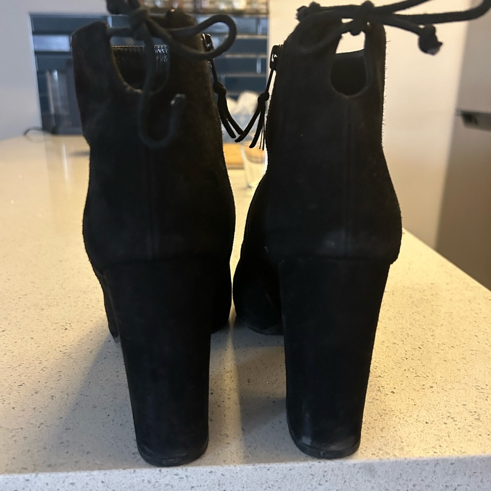 Black suede booties 
Size 41 (fits more like 40.5)
Comes with box and dust bag